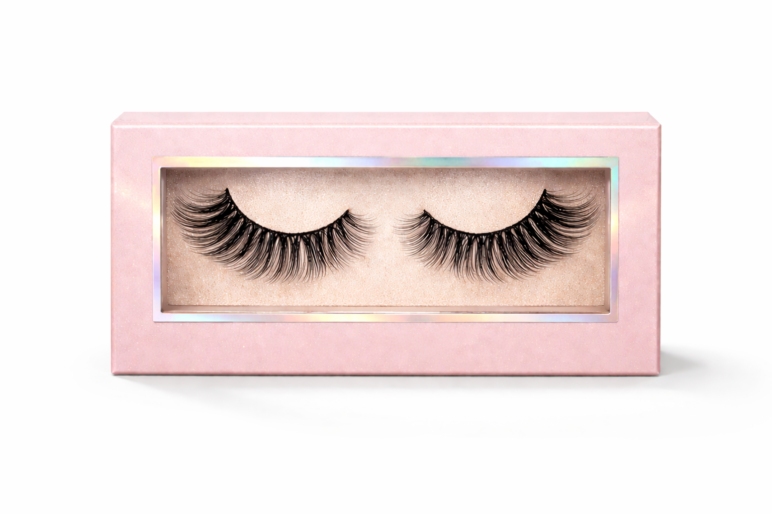 Pair of false eyelashes in a pink box on a white background