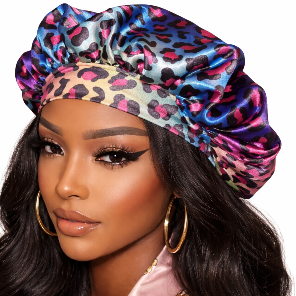 Woman wearing a colorful leopard print satin bonnet on a white background