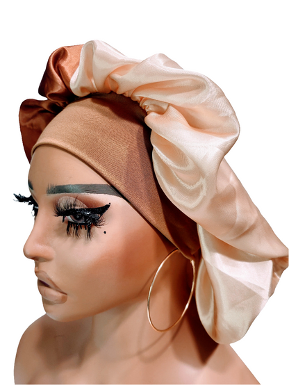 A mannequin head wearing a beige and brown satin hair bonnet with a wide band.