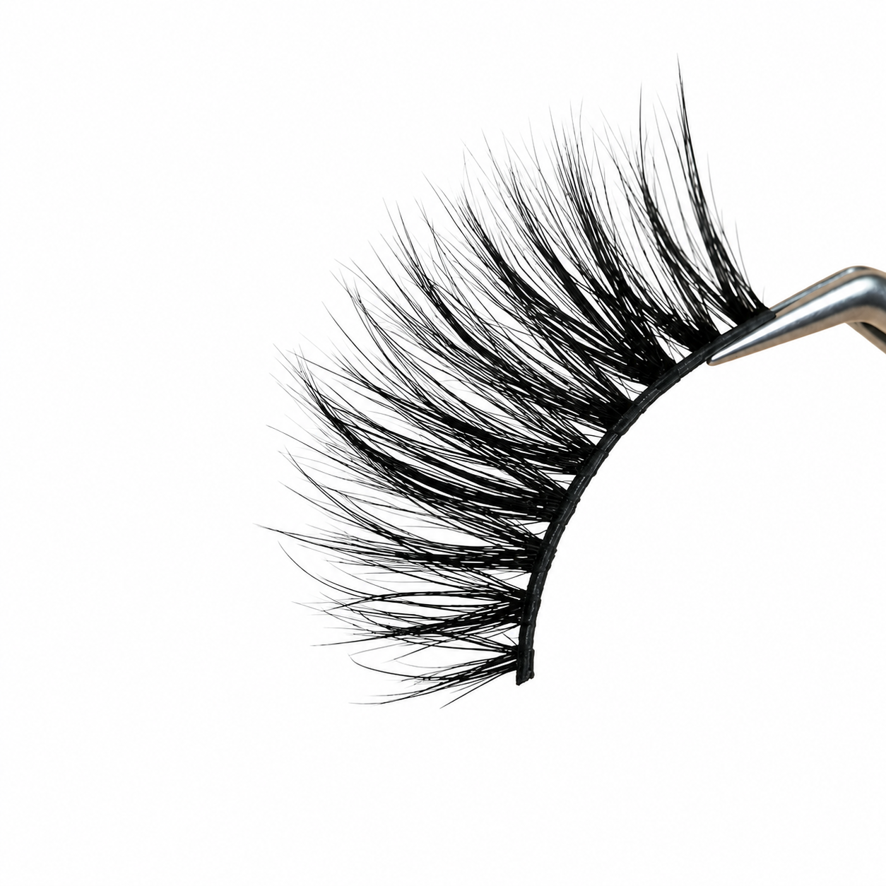 Pair of false eyelashes on a white background