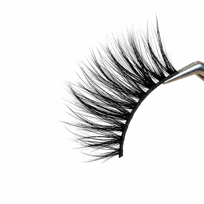 Pair of false eyelashes on a white background