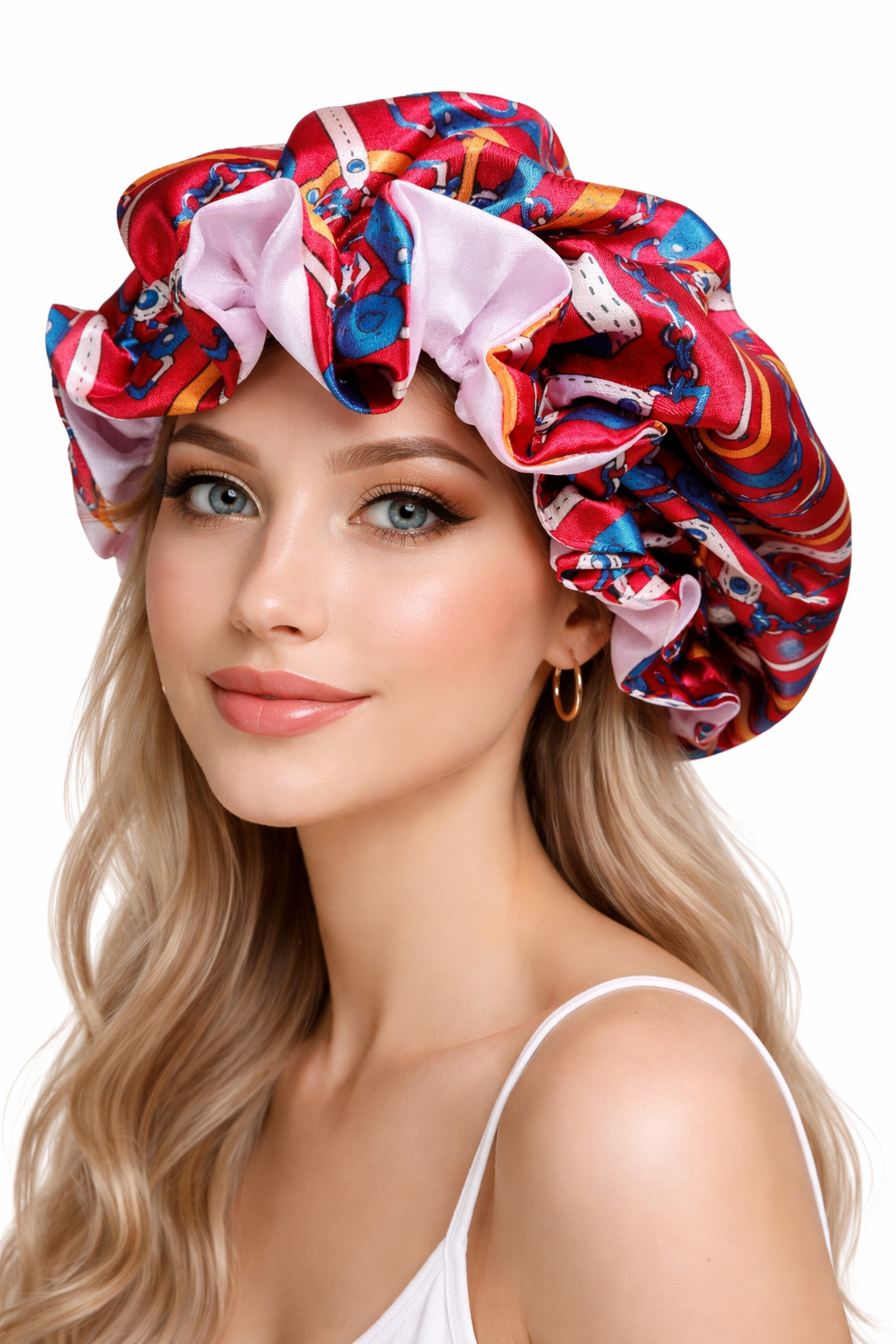 Woman wearing a colorful patterned shower cap on a white background