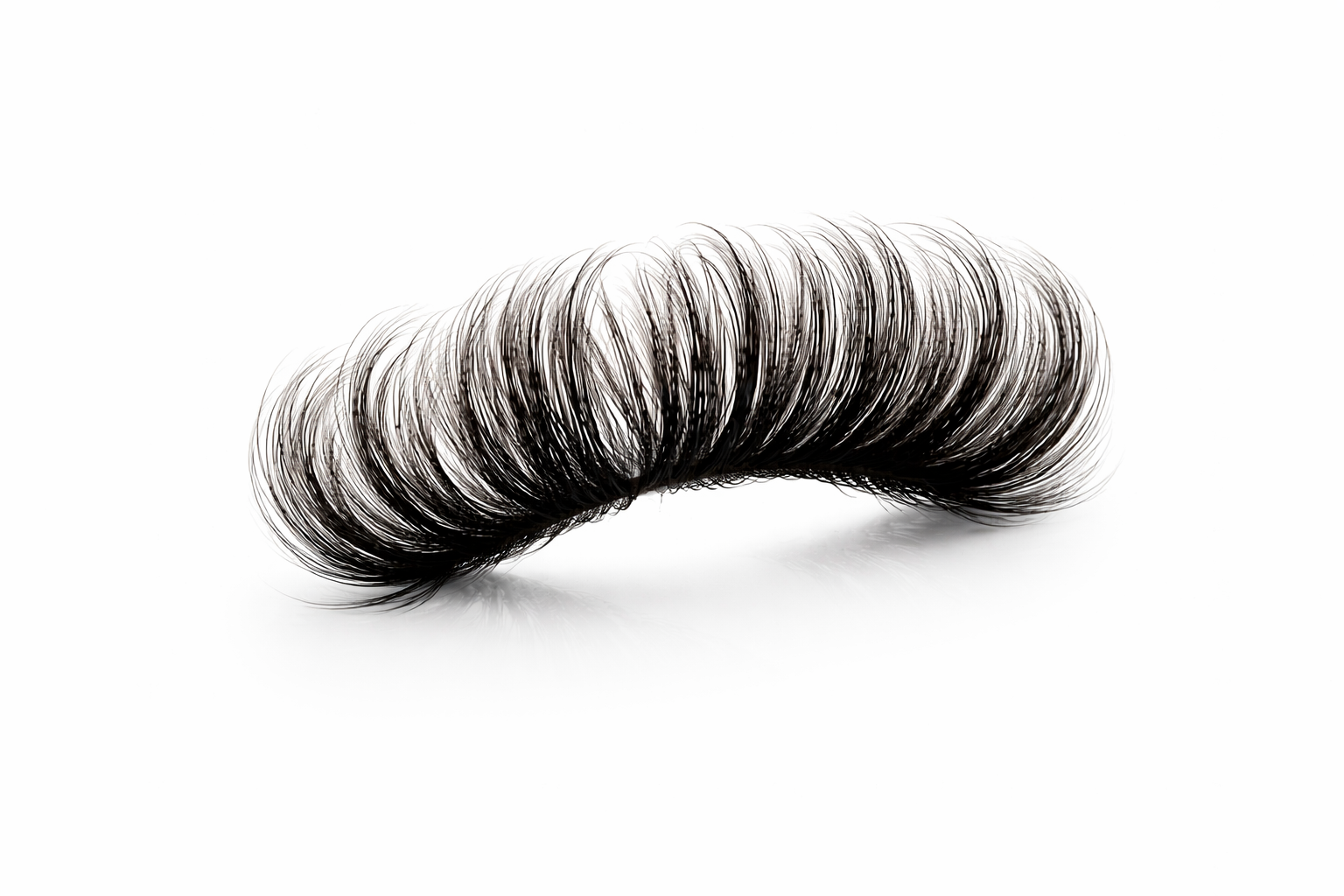 Pair of false eyelashes on a white background