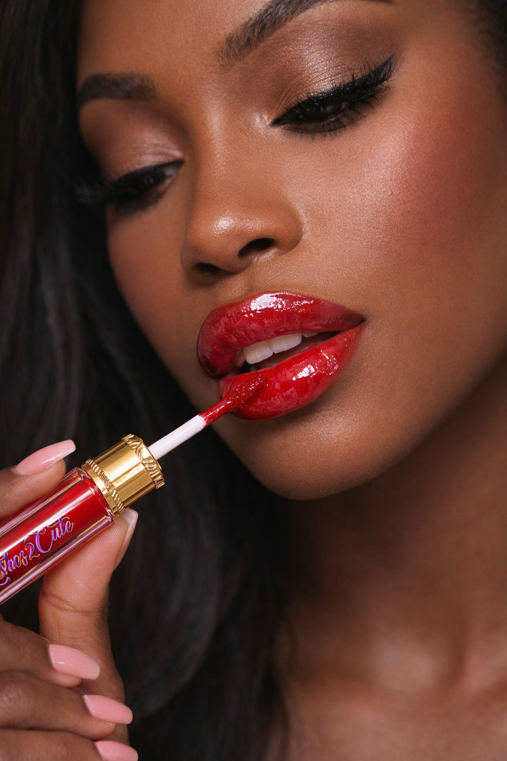 Woman applying red lipstick with a brush
