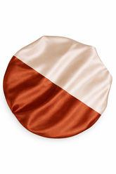 Round satin fabric sample with two-tone color pattern on a white background