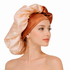 Woman wearing a satin hair bonnet on a white background