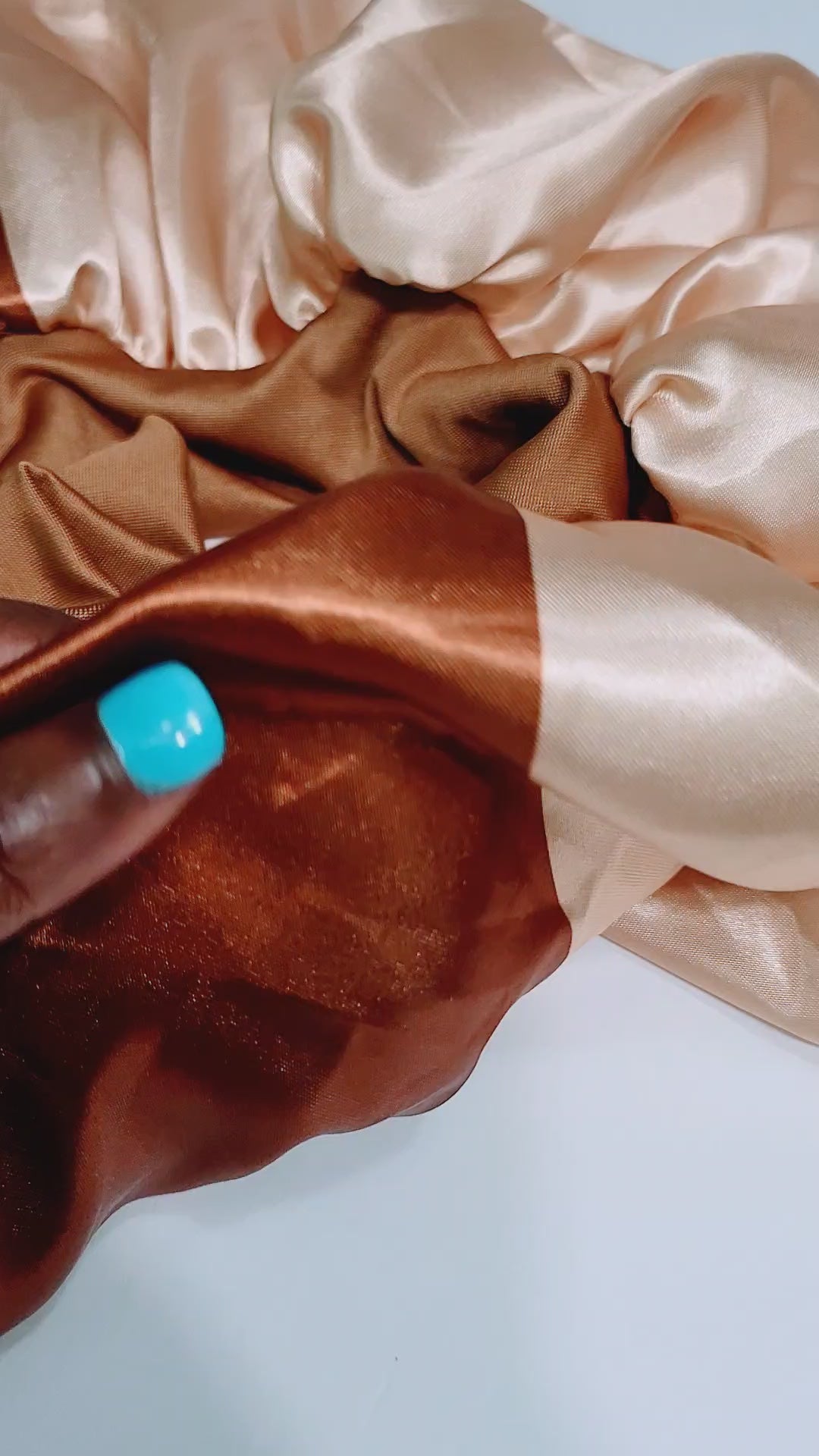 Video showcasing a Beige &amp; Brown Hair Bonnet